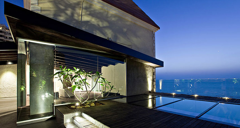 Sea Facing Penthouse by Abraham John Architects