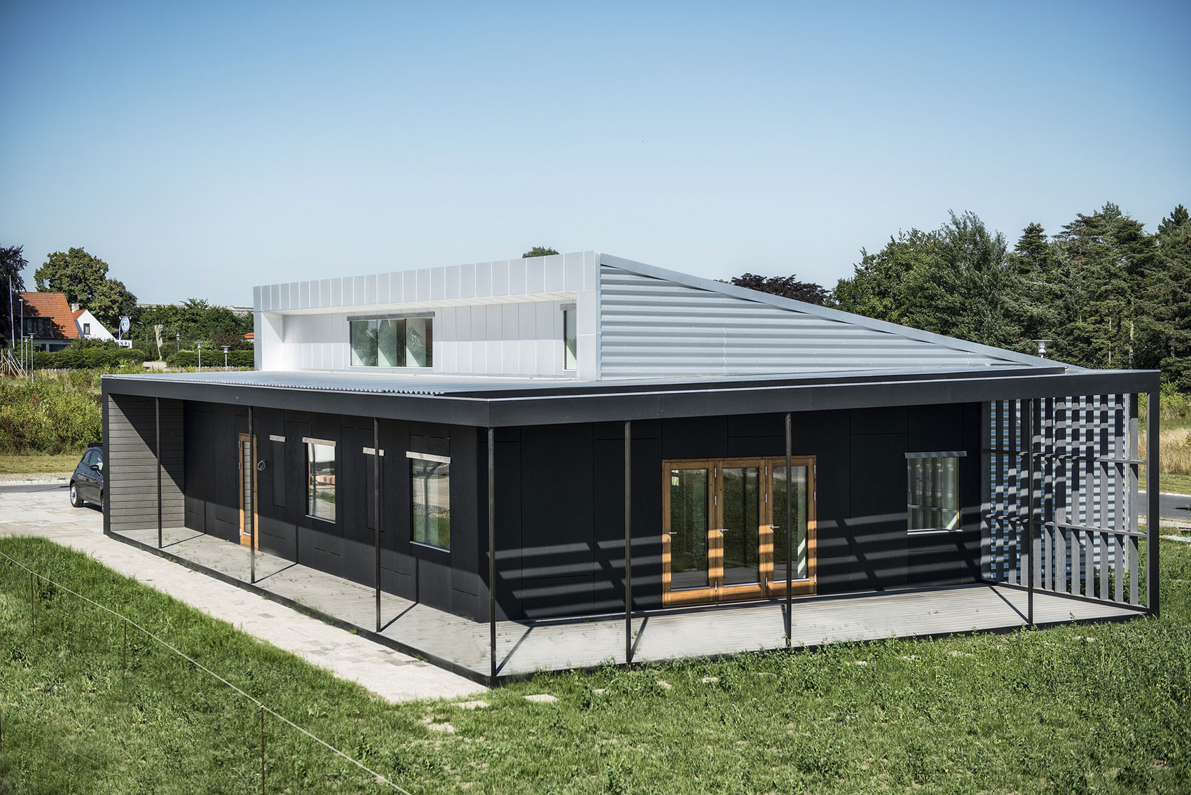 Prefabricated Shipping Container in Denmark: Upcycle House | Homedezen